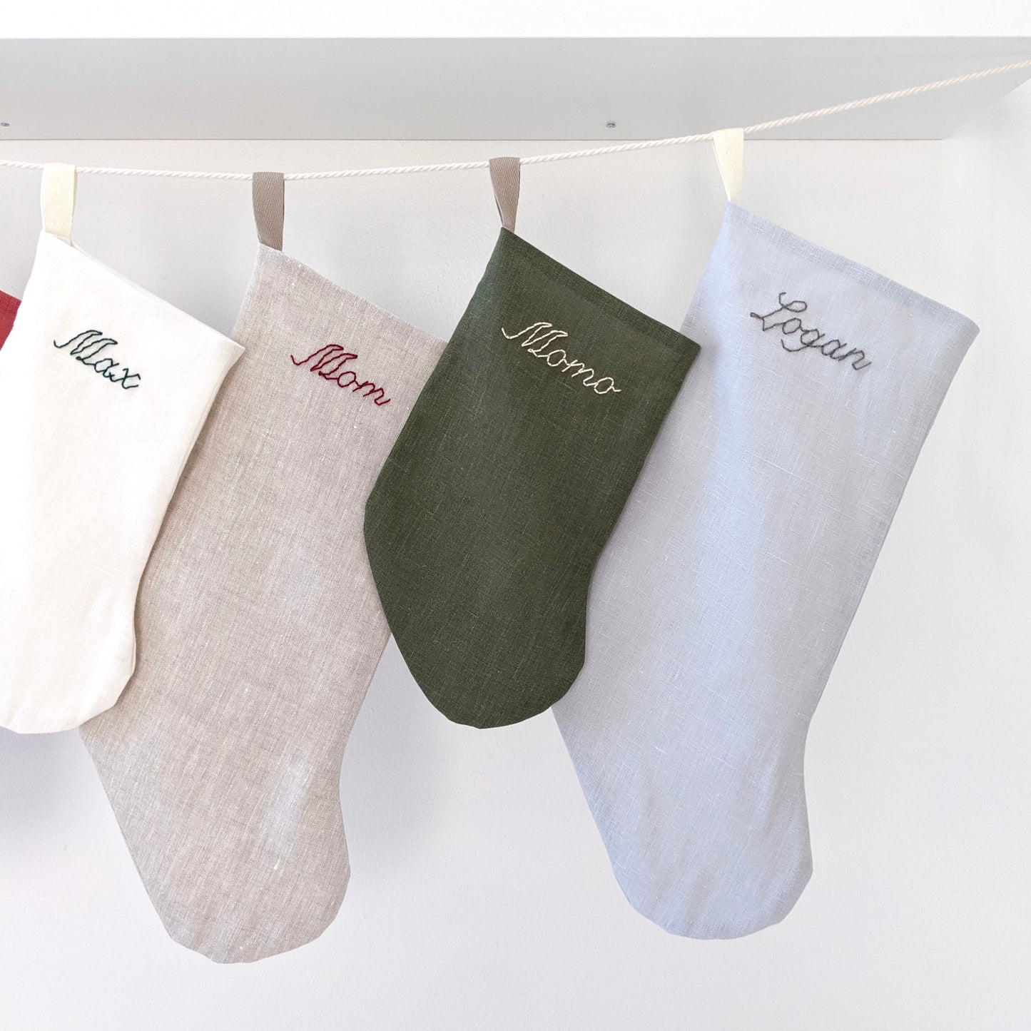 Simple classic hand embroidered linen Christmas stocking with personalized name