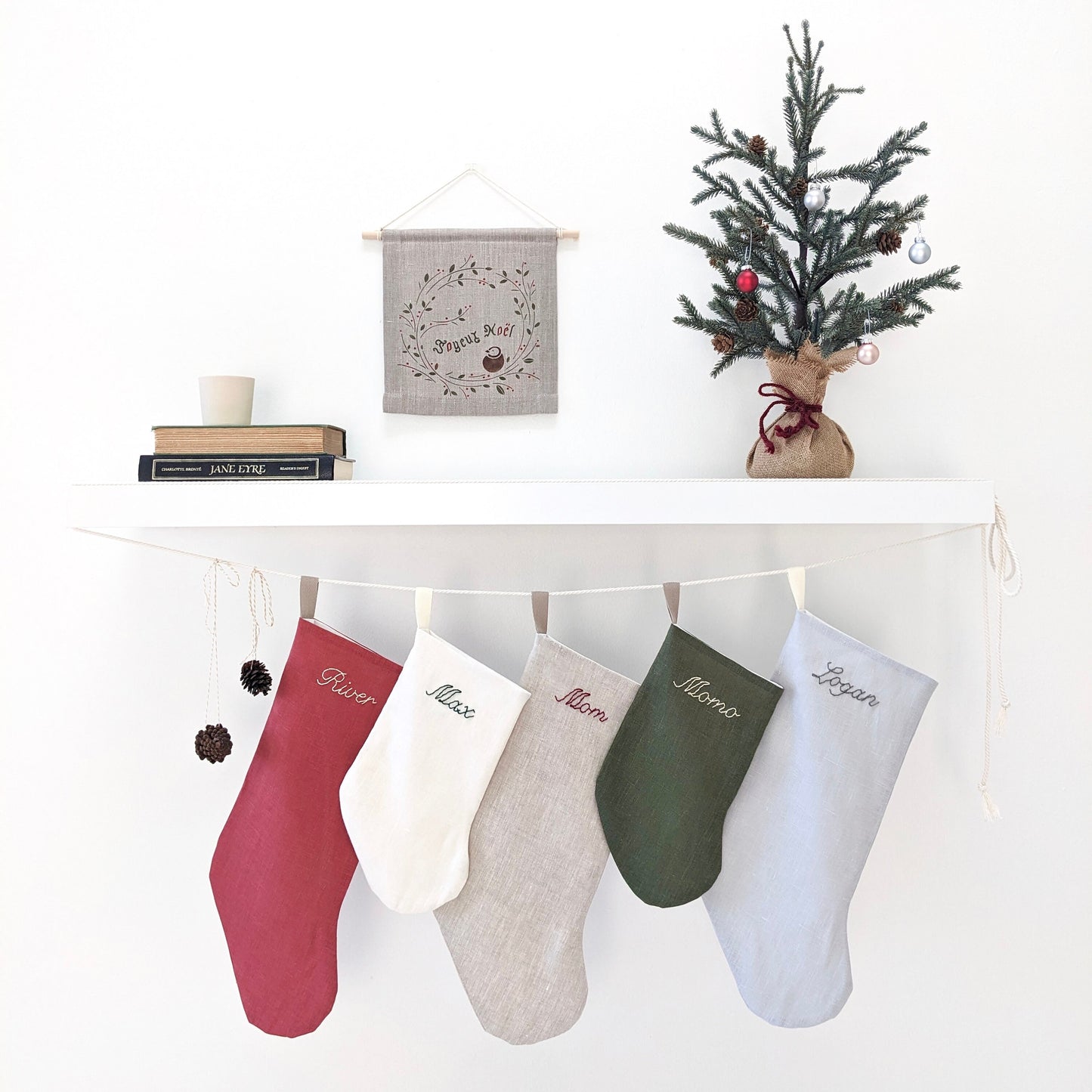 Hand embroidered simple linen Christmas stocking with personalized name