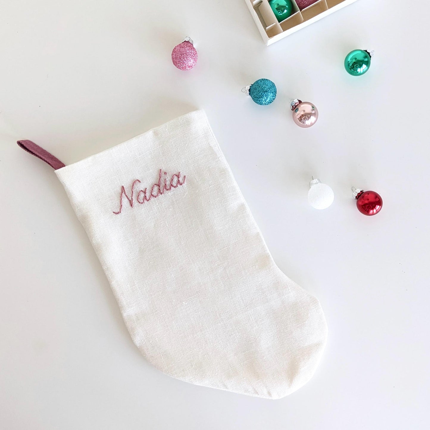 Hand embroidered small ivory linen Christmas stocking with name