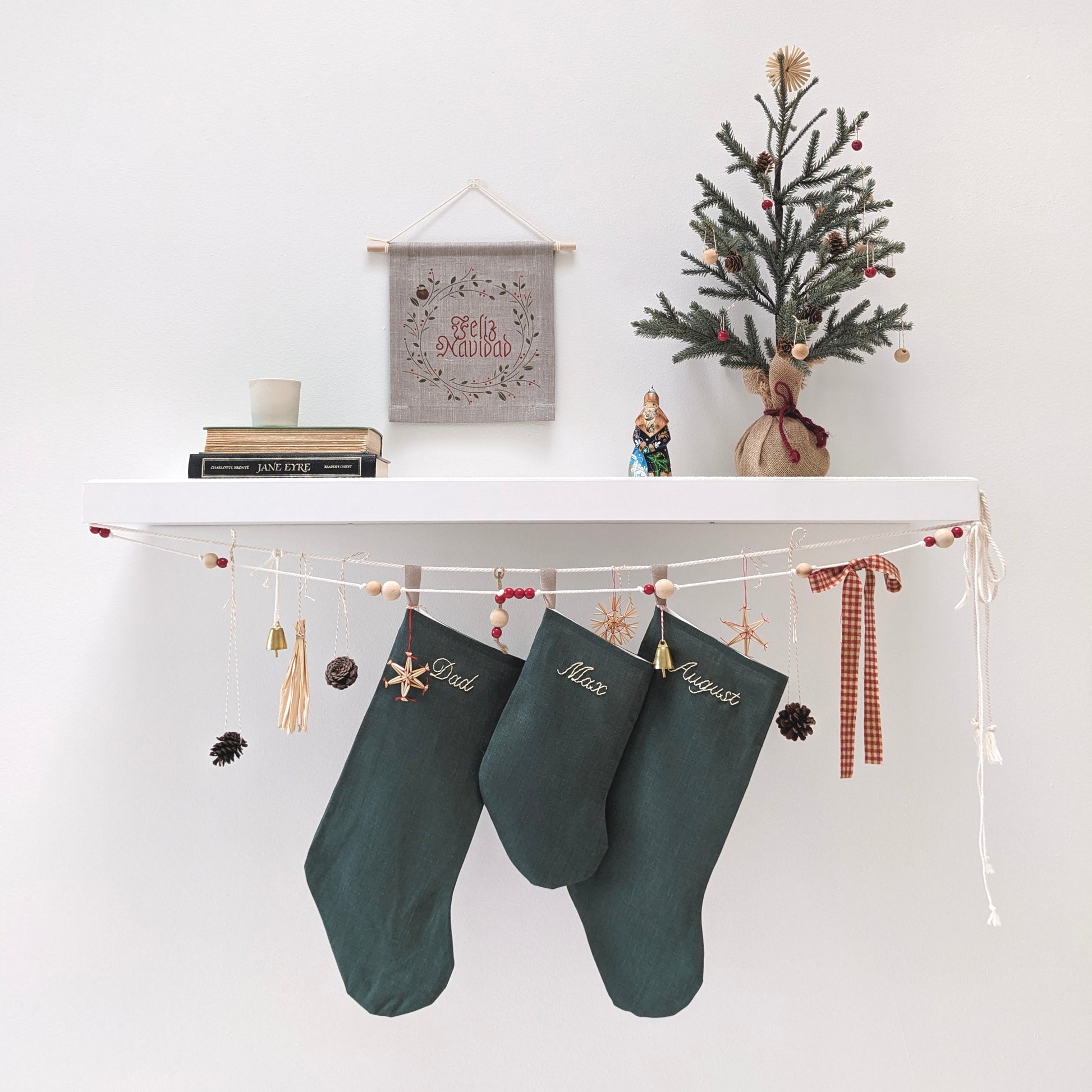 Hand embroidered 100% linen Christmas stocking with personalized name green