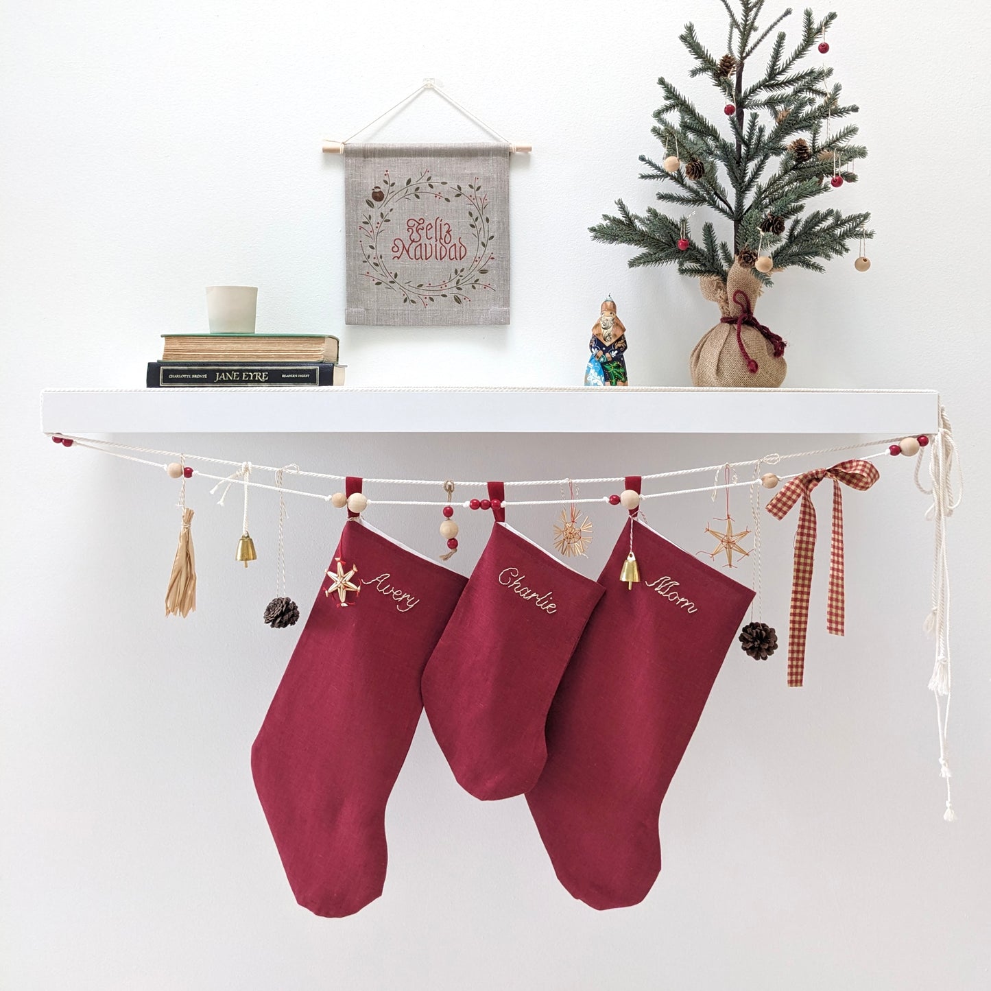 Hand embroidered name linen Christmas stocking in red