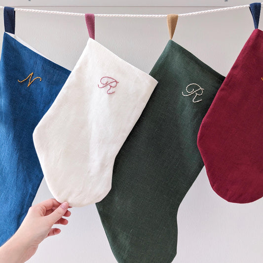 Small, hand embroidered linen Christmas stocking with personalized initial