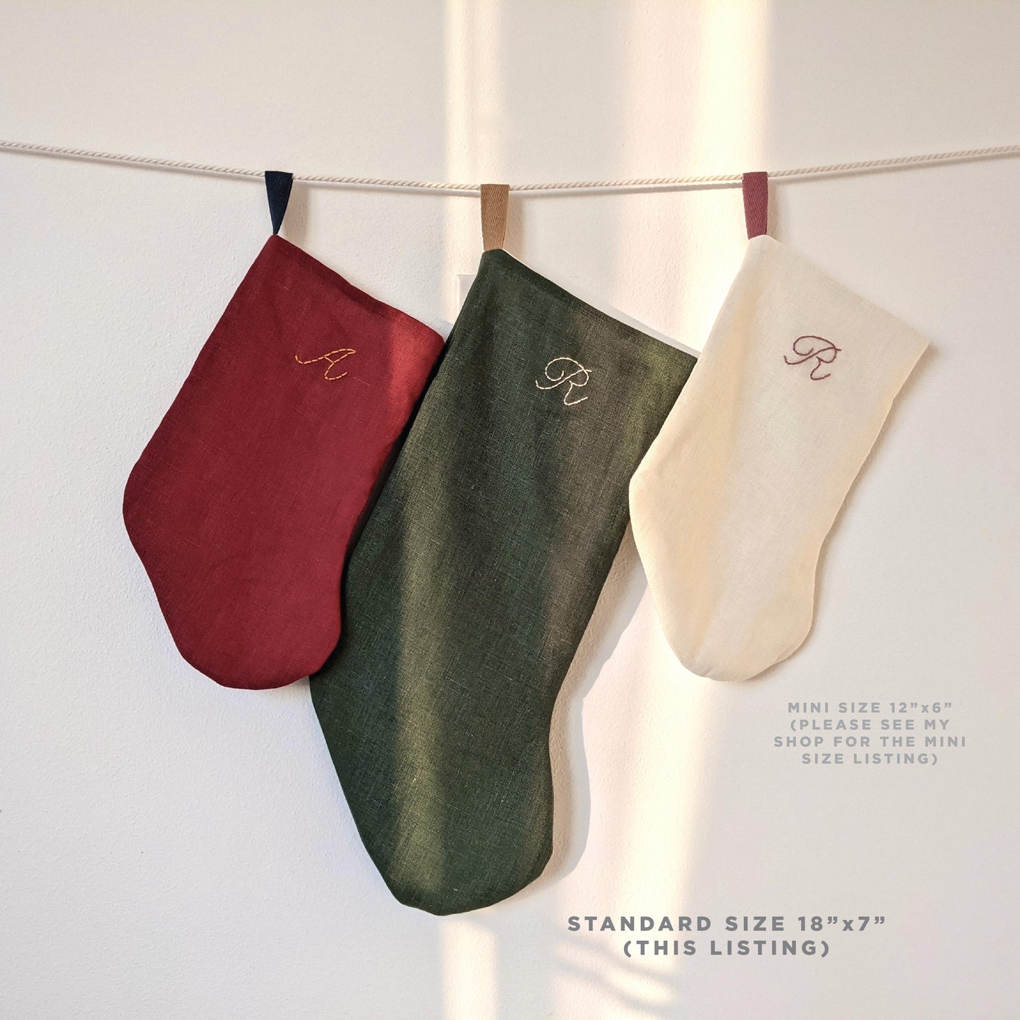 Hand embroidered linen Christmas stocking with personalized initial