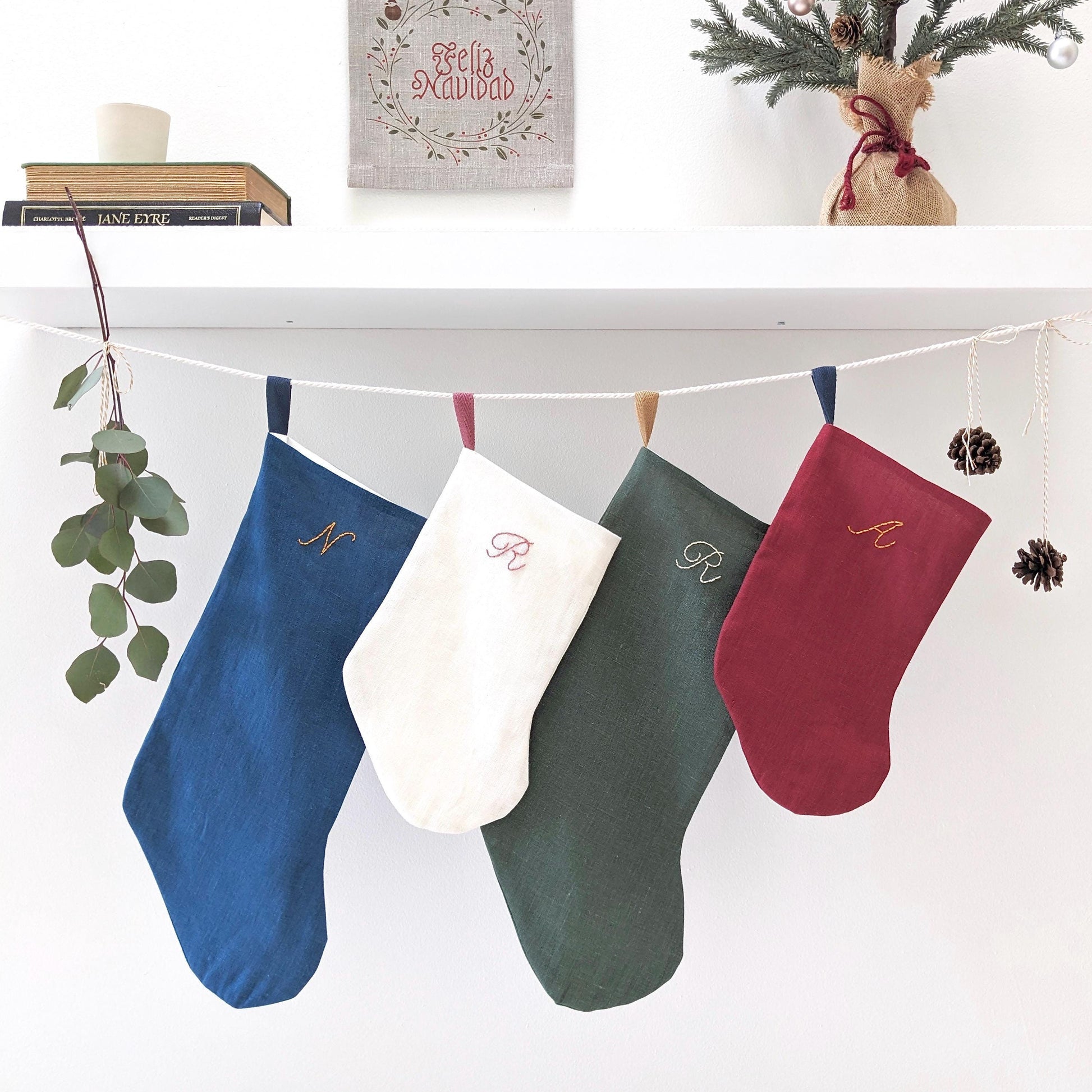 Hand embroidered linen Christmas stocking with personalized initial