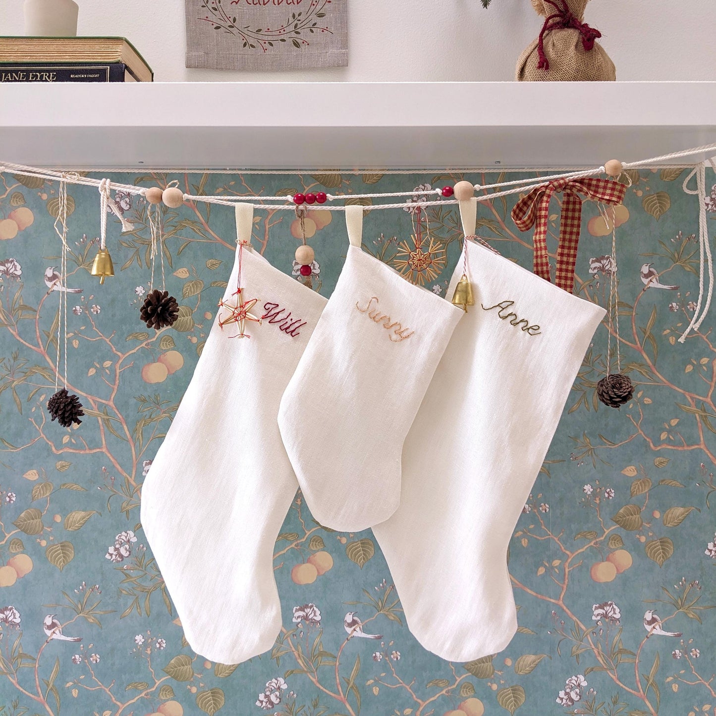 Hand embroidered ivory white linen Christmas stocking with personalized name