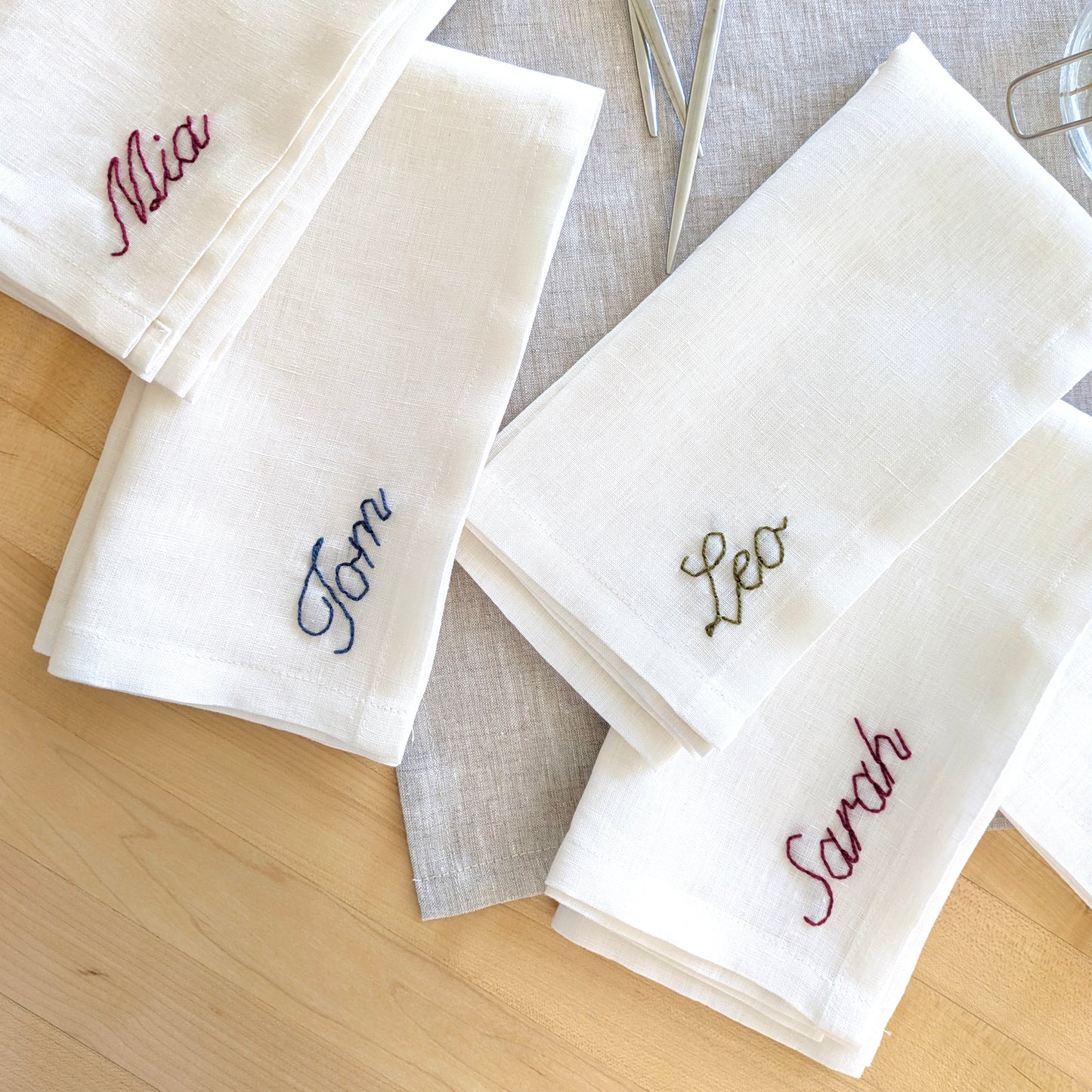 Hand embroidered personalized ivory linen napkin with name