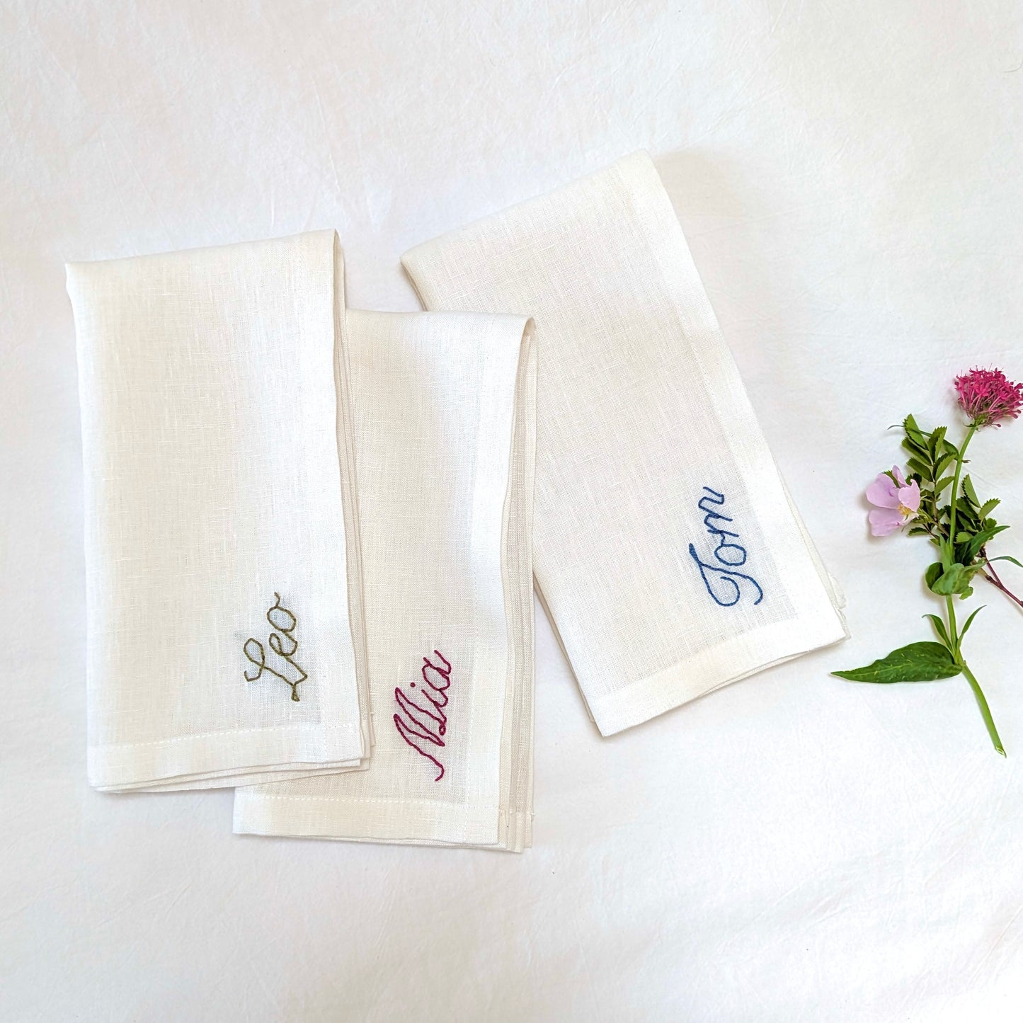 Hand embroidered personalized ivory linen napkin with name