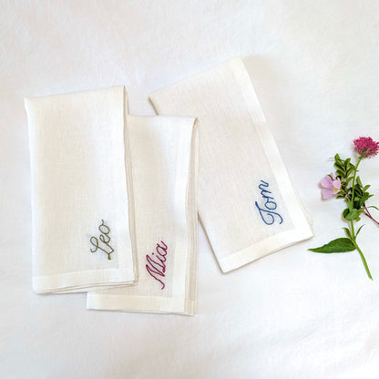 Hand embroidered personalized ivory linen napkin with name