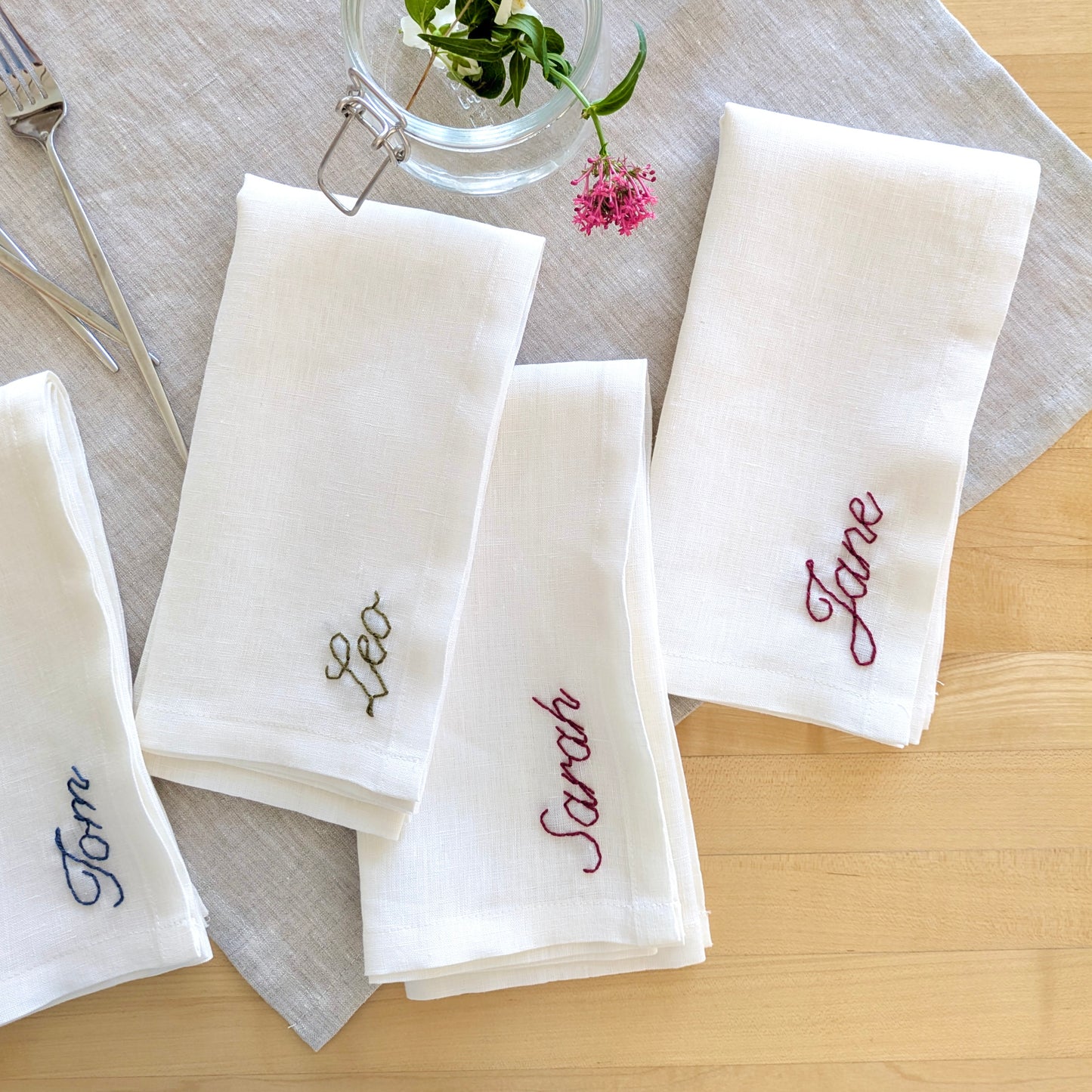 Hand embroidered custom white linen napkin with name
