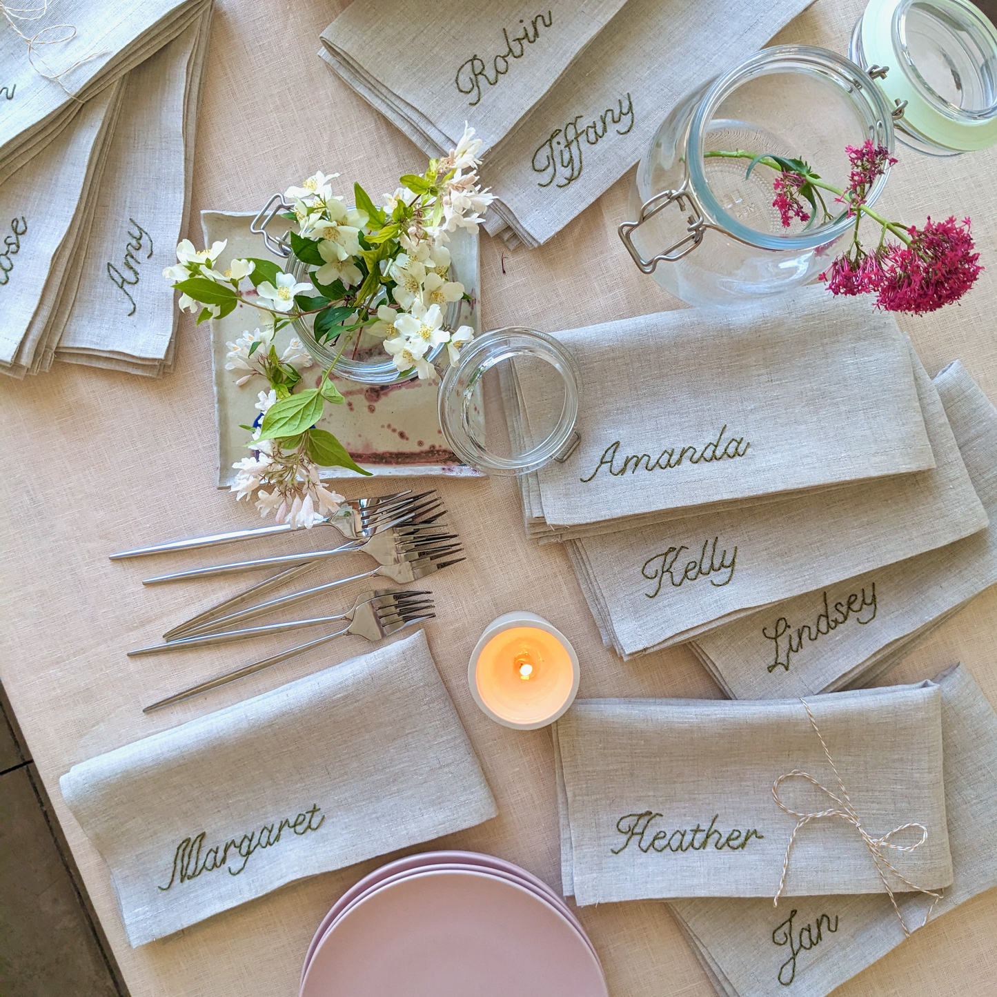 Hand embroidered linen napkin with personalized name for wedding, birthday, or special event