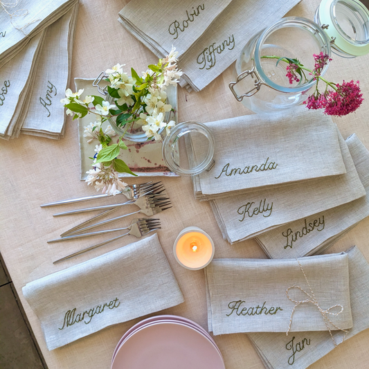 Hand embroidered linen napkin with personalized name for wedding, birthday, or special event