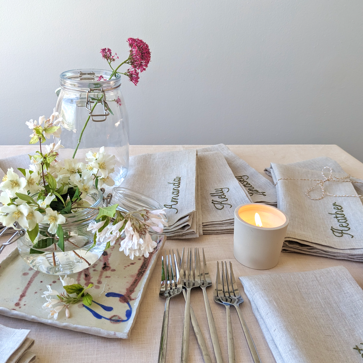 Hand embroidered linen napkin with custom name