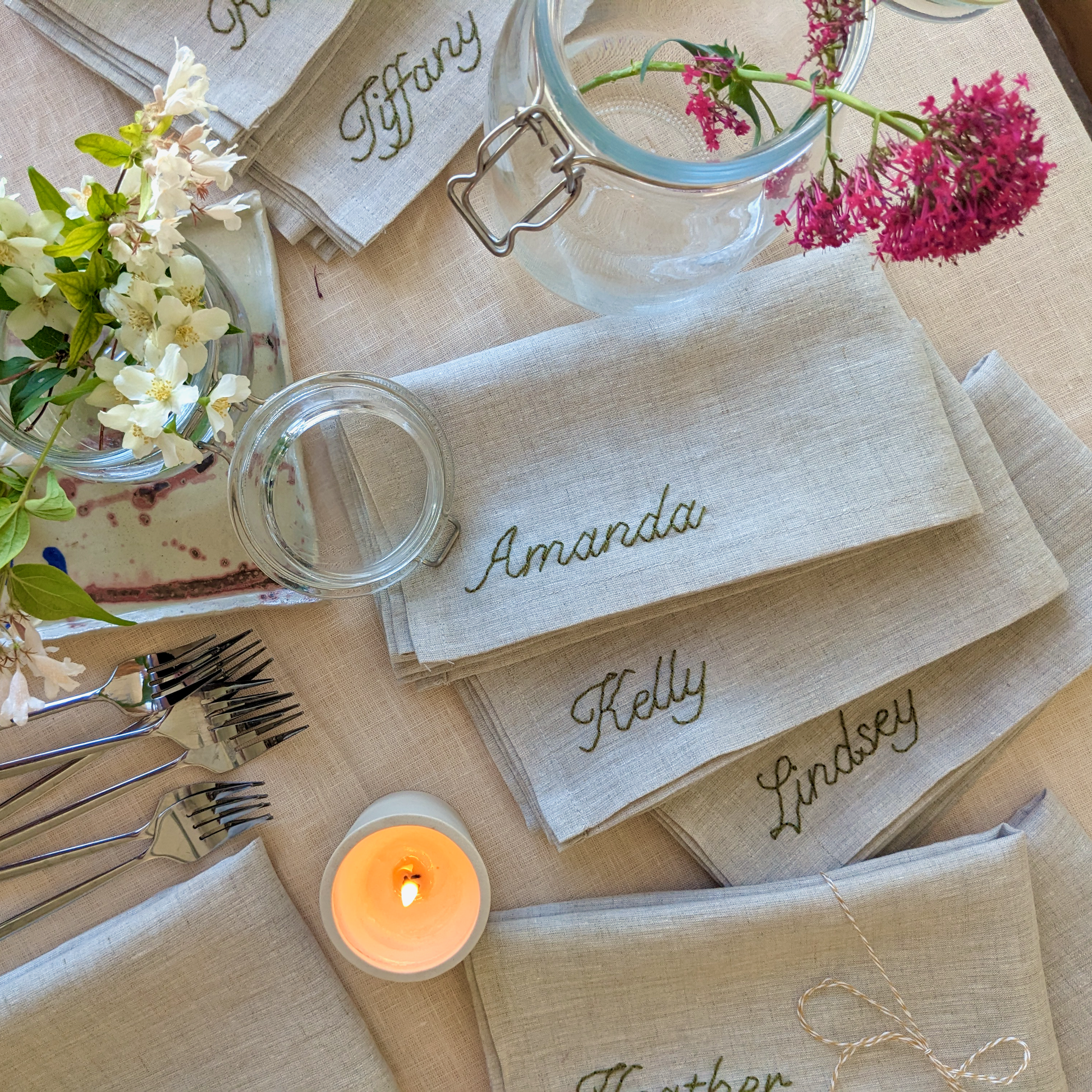 Hand embroidered linen napkin in natural with custom name for wedding, birthday, or special event