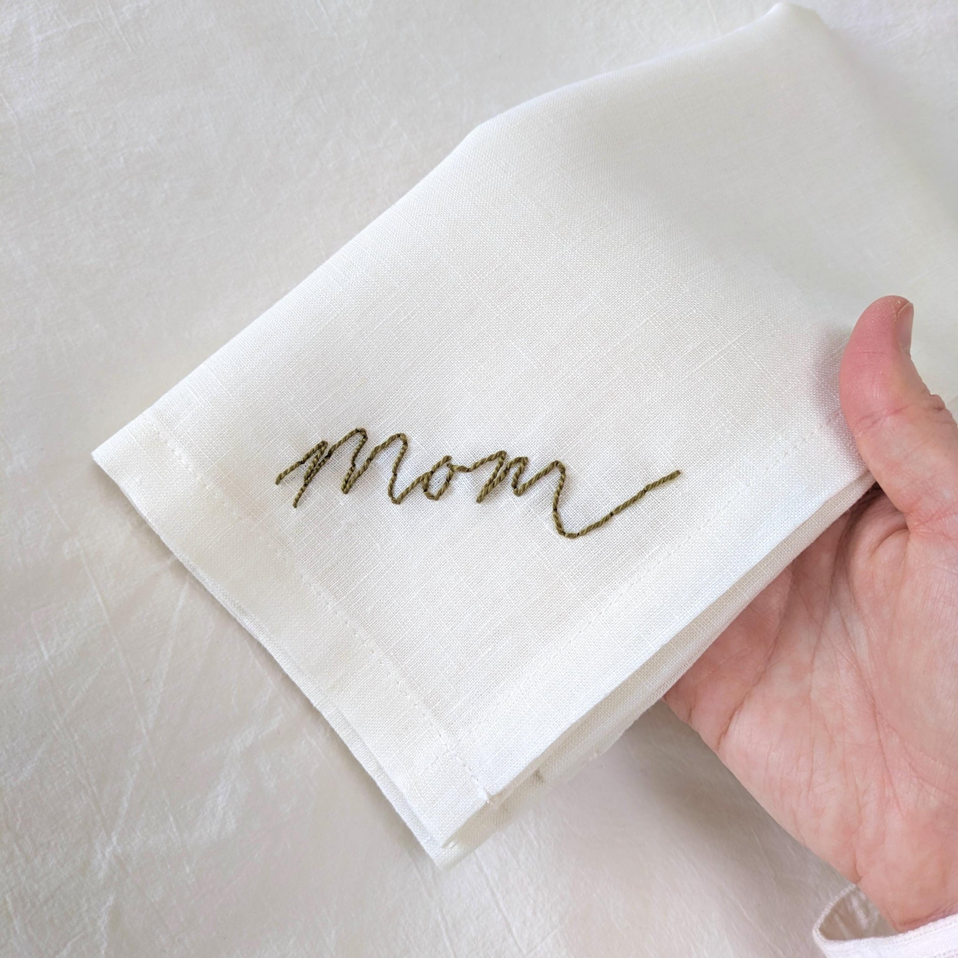 Ivory linen napkin with Mom hand embroidered in your handwriting