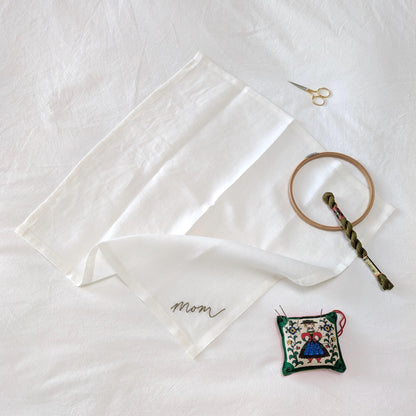 Ivory linen napkin with Mom hand embroidered in your handwriting