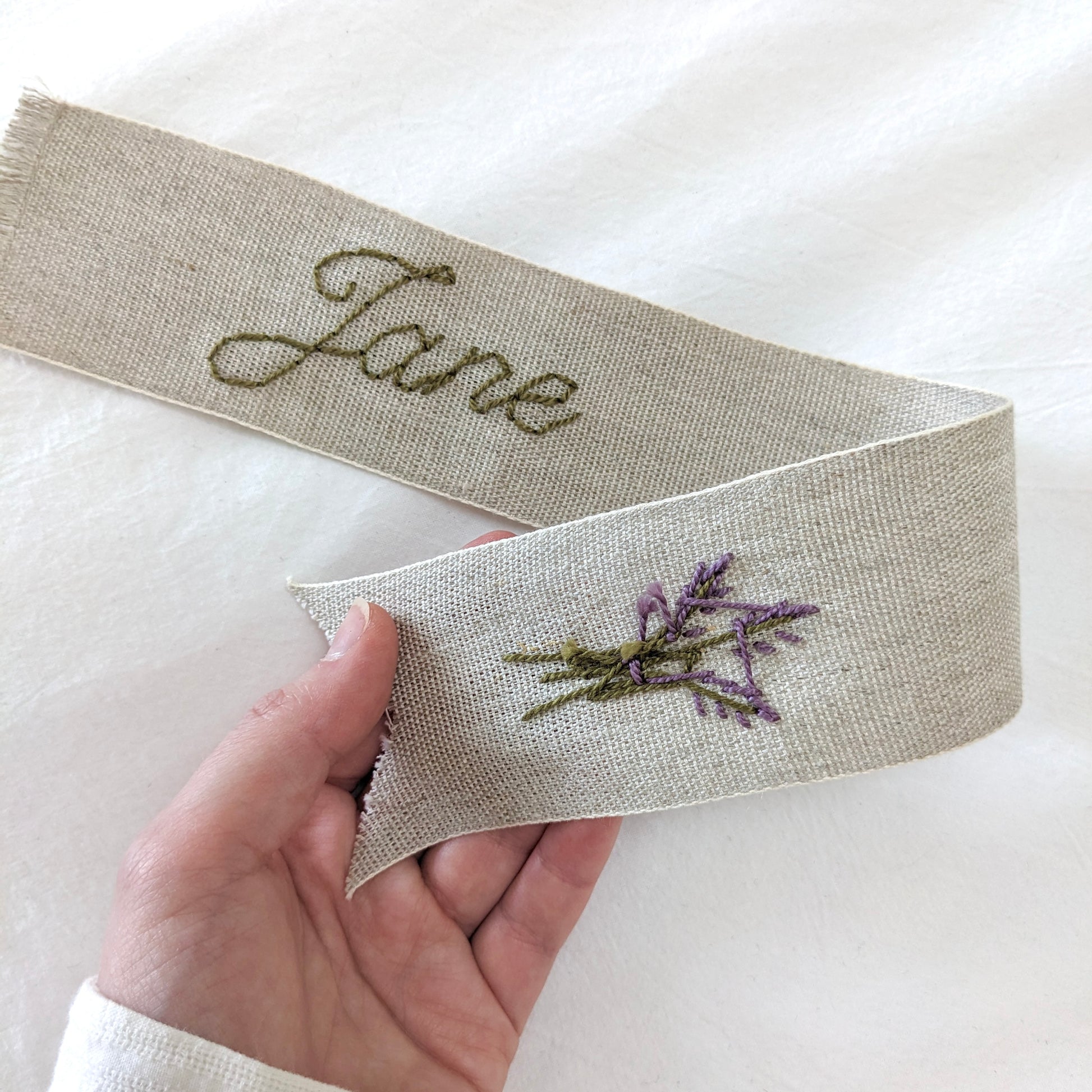 Hand embroidered linen ribbon bookmark with personalized name