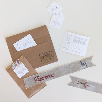 Hand embroidered linen ribbon bookmark with personalized name