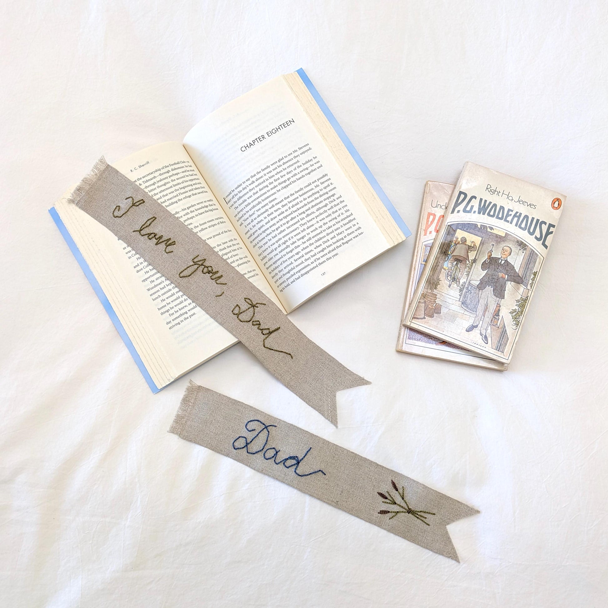 Hand embroidered linen ribbon bookmark that says Dad or a custom phrase in your handwriting