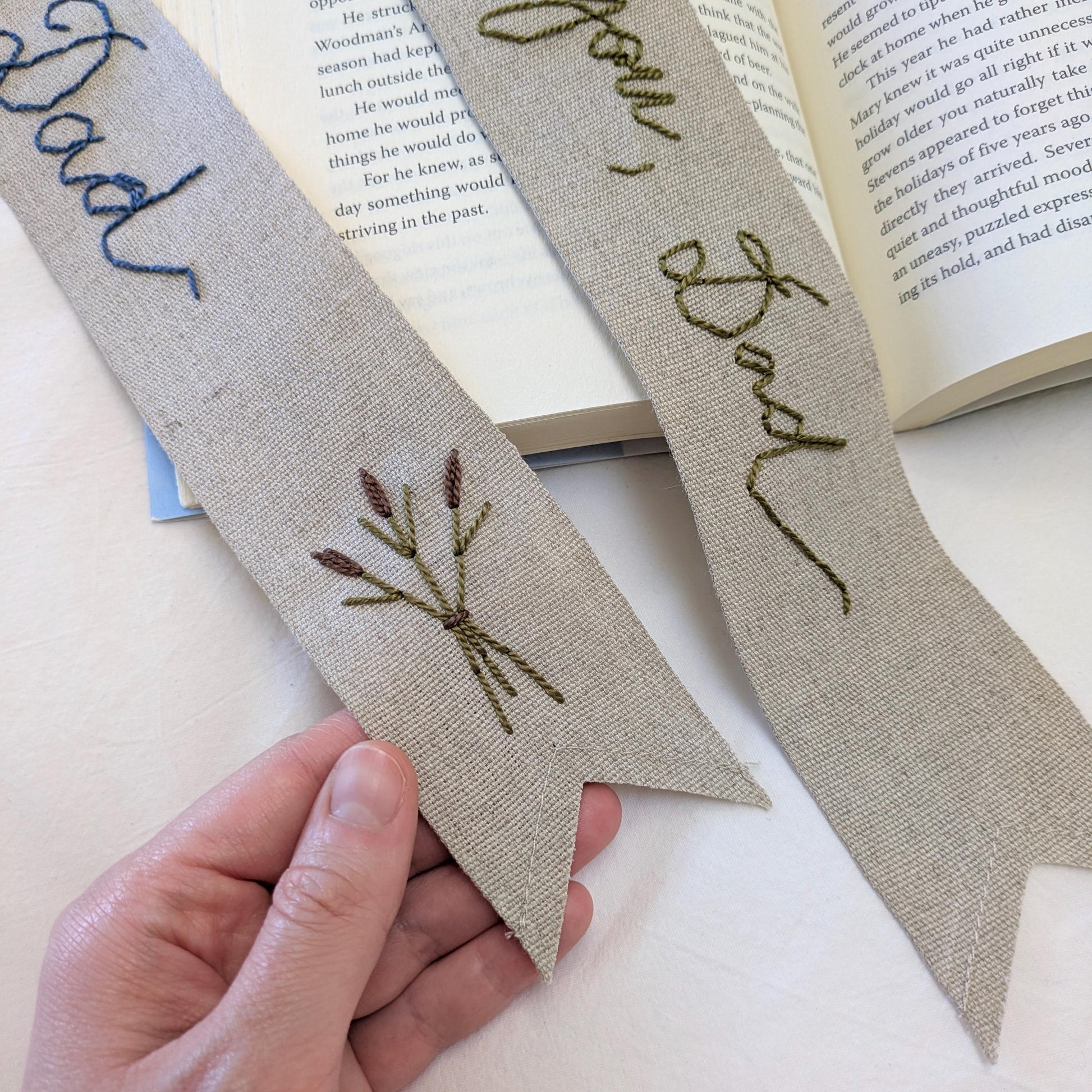 Hand embroidered linen ribbon bookmark that says Dad with cattail motif or a custom phrase in your handwriting
