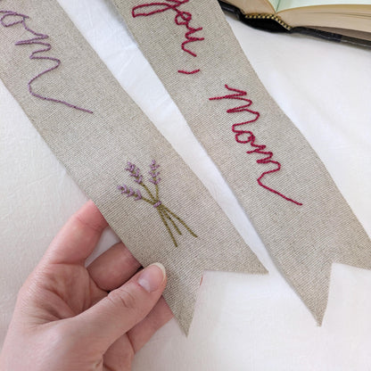 Hand embroidered linen ribbon bookmark that says Mom or a custom phrase in your handwriting