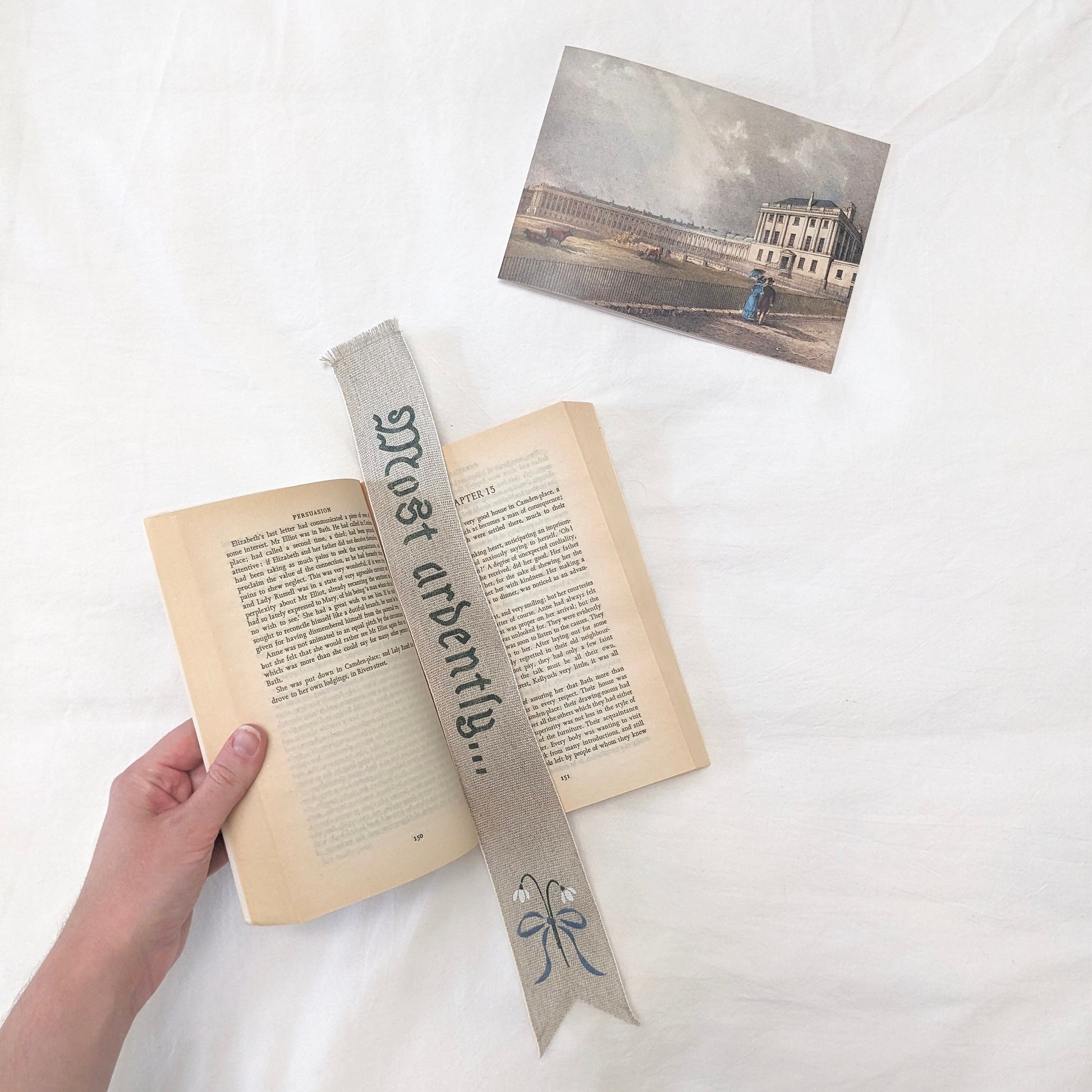 Hand painted linen ribbon bookmark that reads "Most ardently..." from Pride and Prejudice, Mr. Darcy