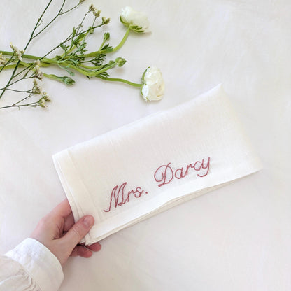 Hand embroidered linen napkin with custom text