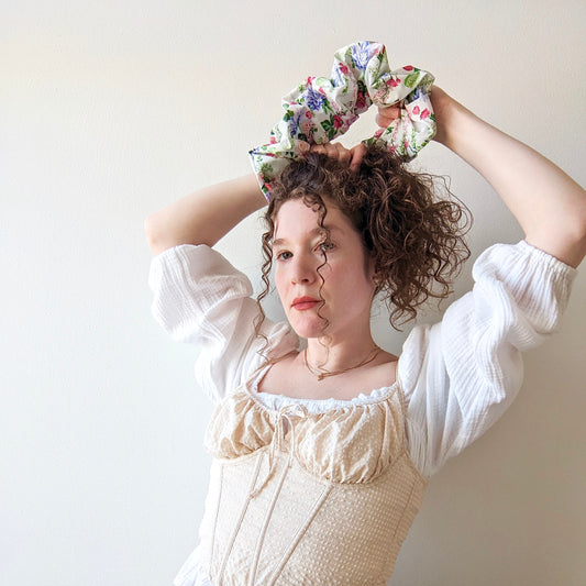 Giant scrunchie with coquette floral pattern and white background